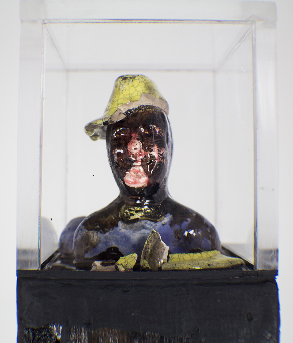 “Homenaje" Charles Romuald Gardes 1890-1935 - Metal base, burned wood, Carlos Gardel mini broken sculpture acrylic box - 3-1/2”x3-1/2”x58” - © Flavio Bisciotti