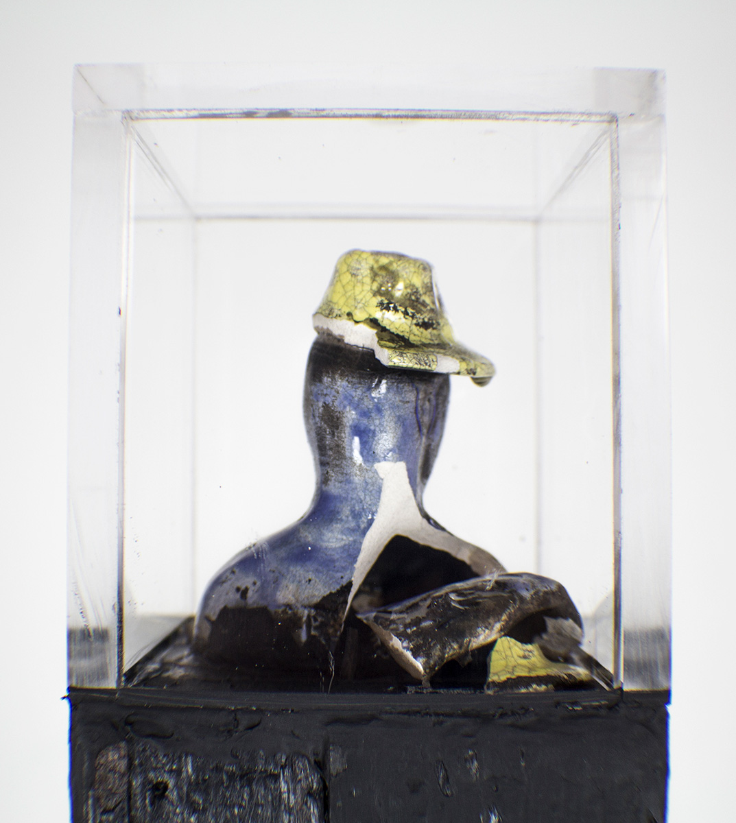 “Homenaje" Charles Romuald Gardes 1890-1935 - Metal base, burned wood, Carlos Gardel mini broken sculpture acrylic box - 3-1/2”x3-1/2”x58” - © Flavio Bisciotti