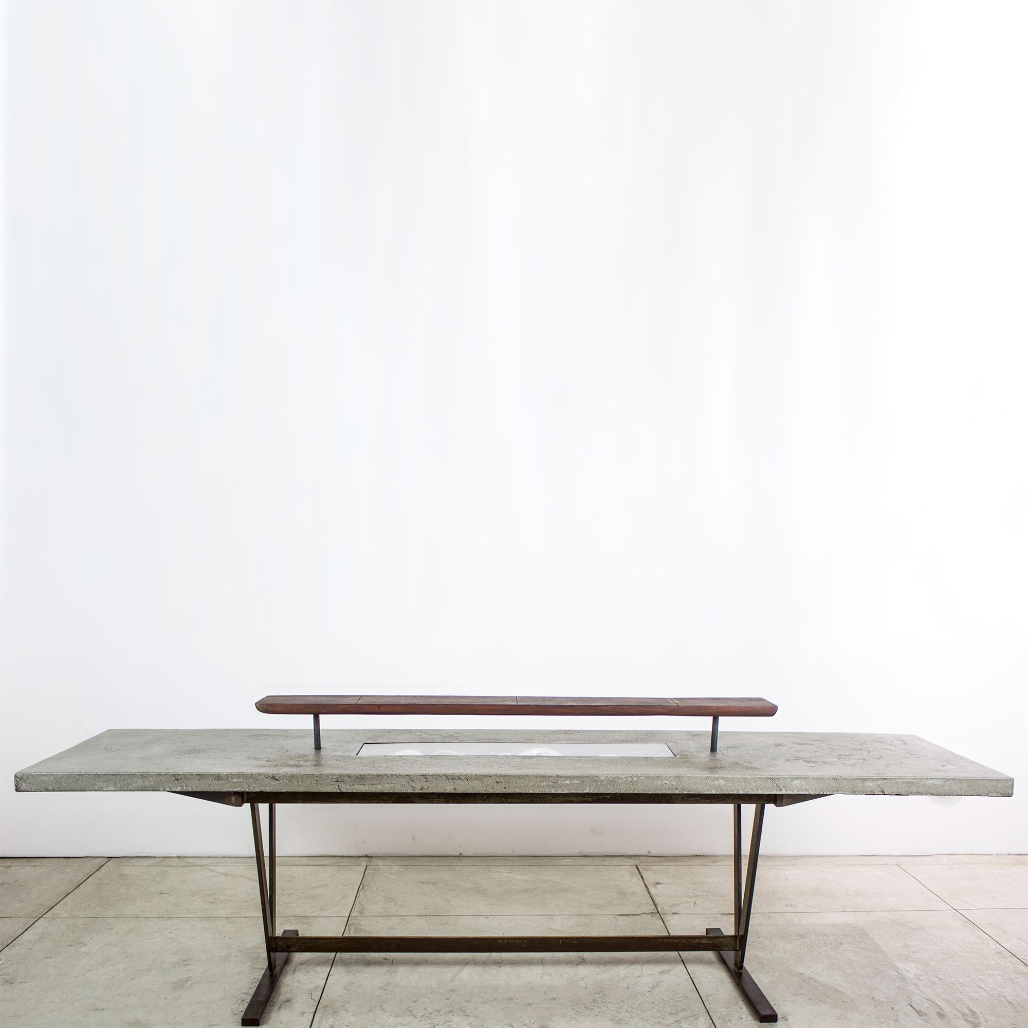 “12 guests garden table” - Metal base concrete top, electrical fixture and broken china - 28”x108”x29” - © Flavio Bisciotti