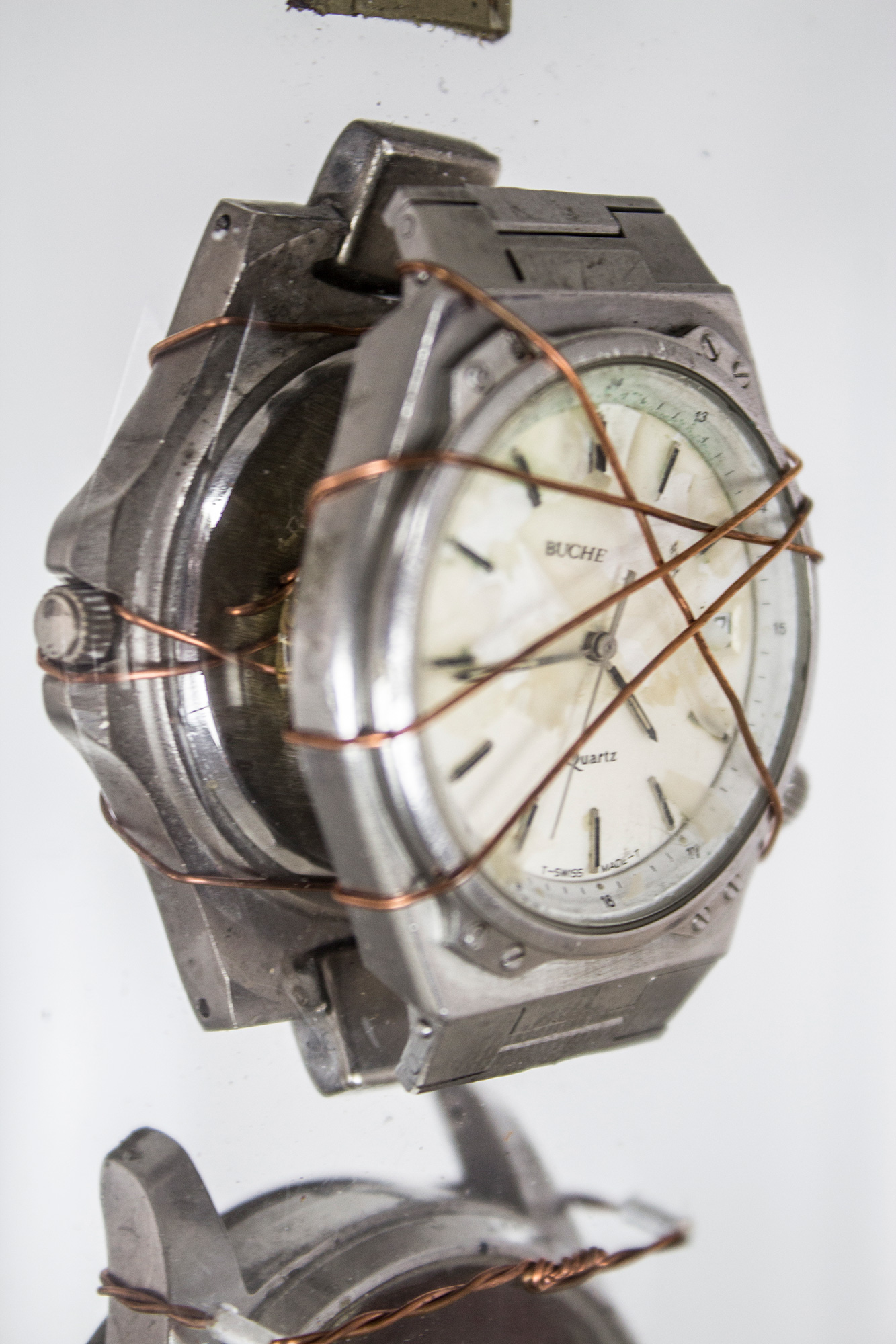 “Time” - Sculpture, Metal base, burned wood, Watches, Acrylic Box - 4”x4”x67-1/2” - © Flavio Bisciotti